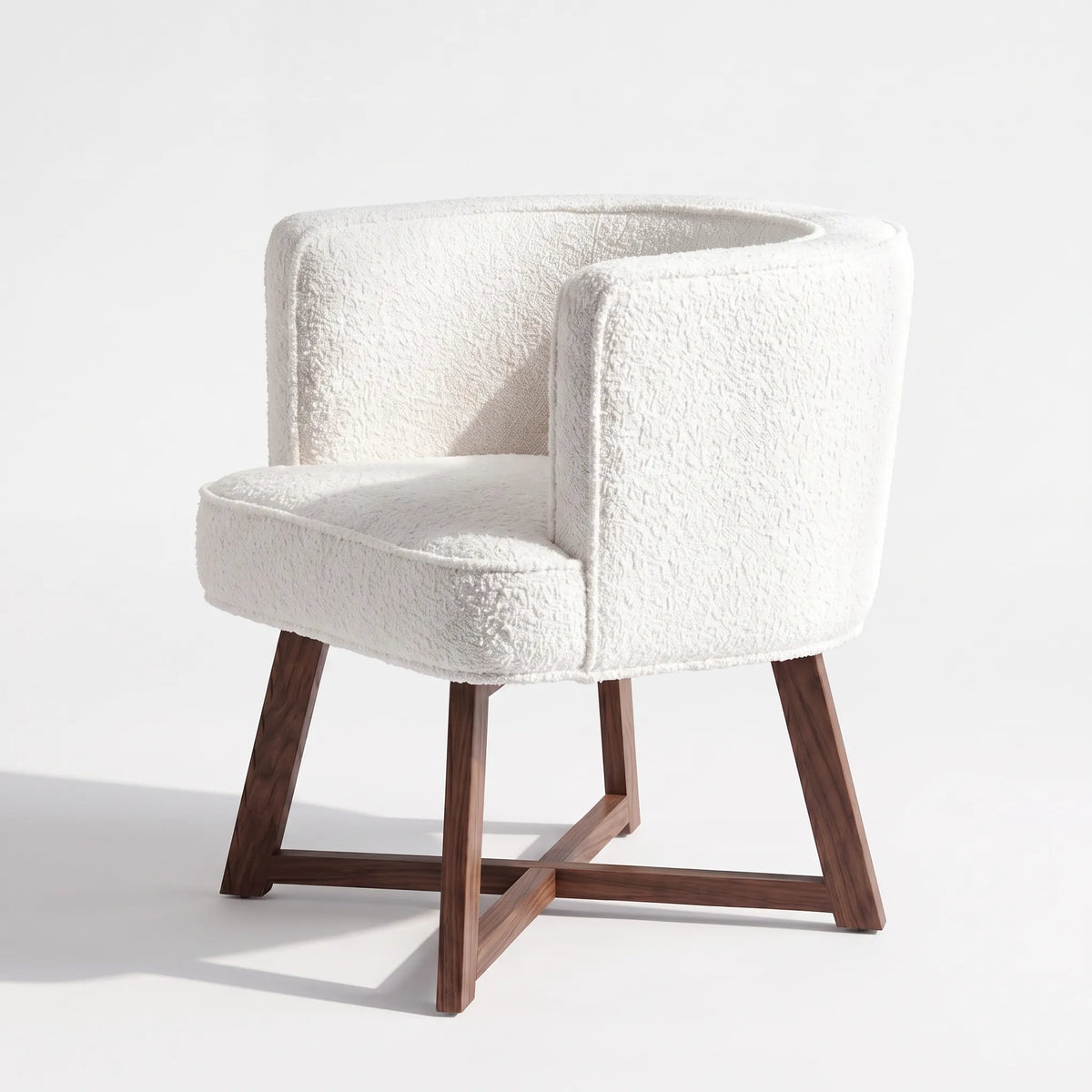 Sillón Ocasional Curvo en Bouclé Marfil con Base en X de Nogal - Detalle de Ensamble | LEMICH Alta Ebanistería Residencial