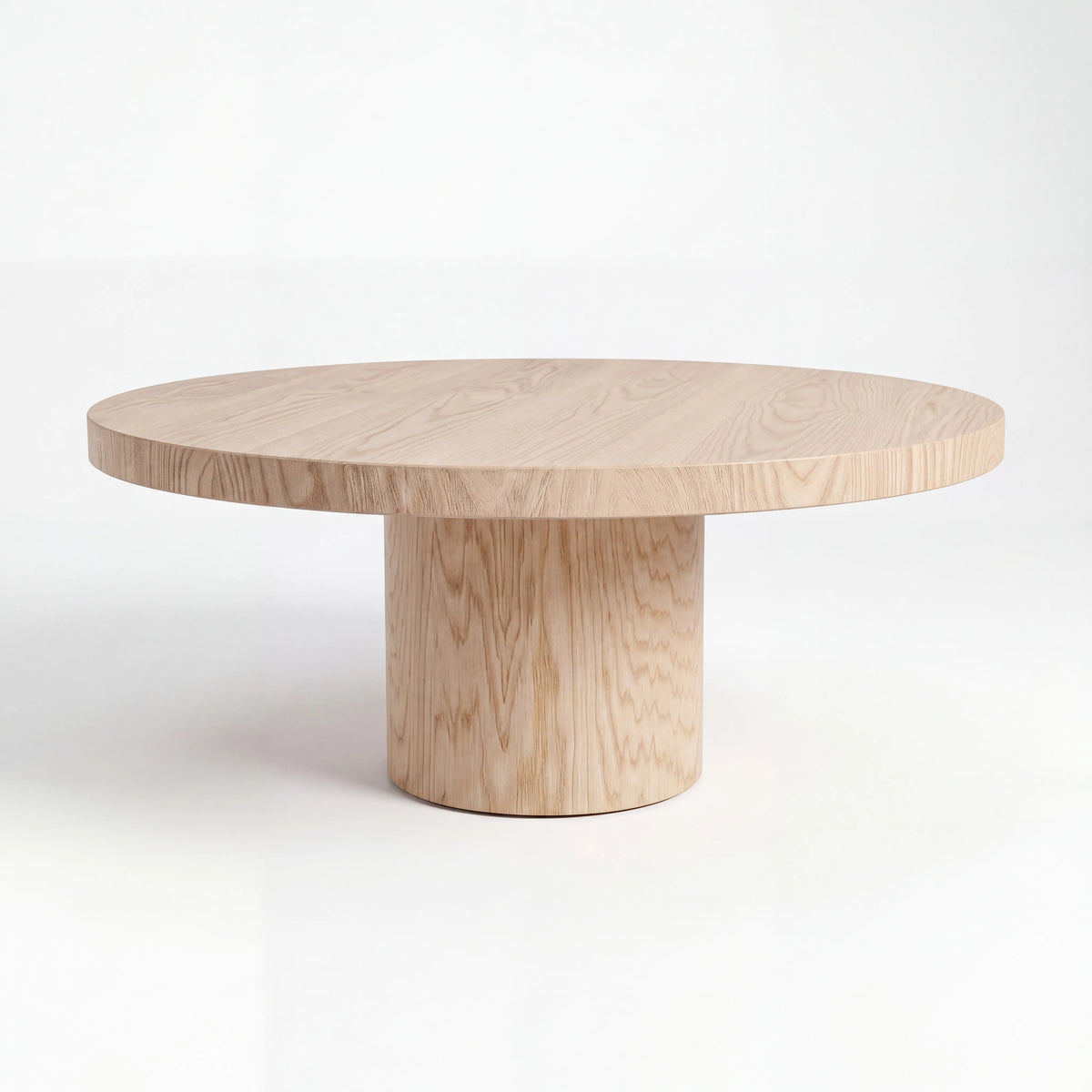 Mesa de Centro Redonda Monolítica en Roble Blanco con Pedestal Central - Detalle de Ensamble | LEMICH Alta Ebanistería Residencial