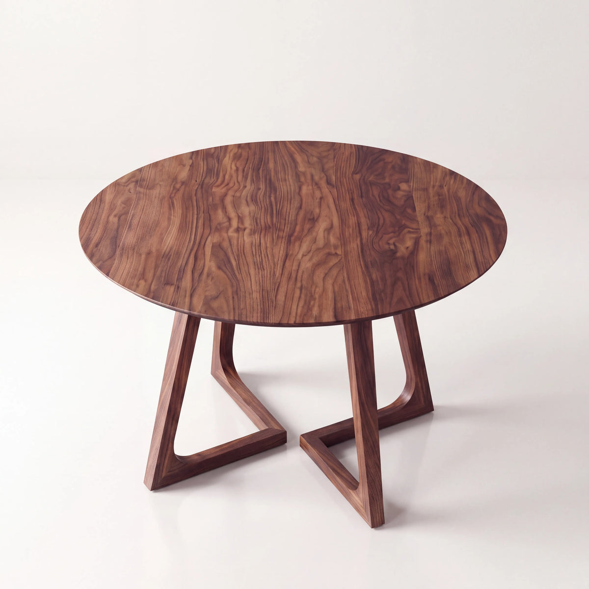 Mesa de Comedor Redonda Prisma en Nogal Americano - Ambientada | LEMICH Alta Ebanistería Residencial